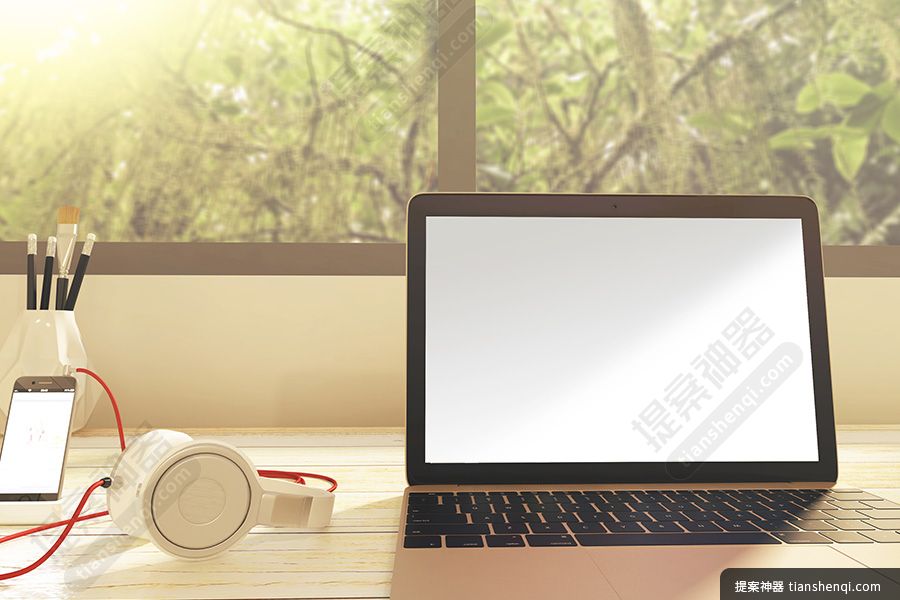 正面视角书桌Macbook场景样机素材